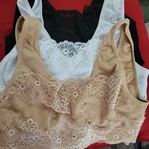 Matching Set of 3 identical sports bras with lace panel front.